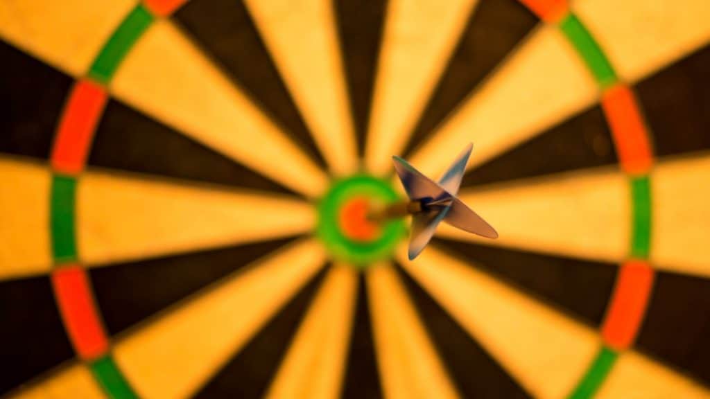 bulls eye with an arrow in the target