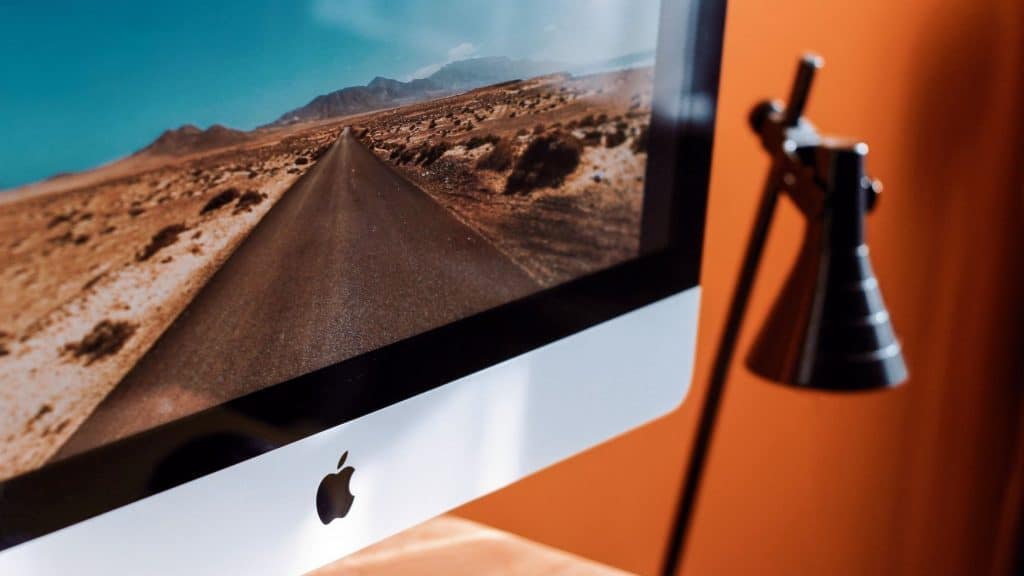 apple laptop on a desk