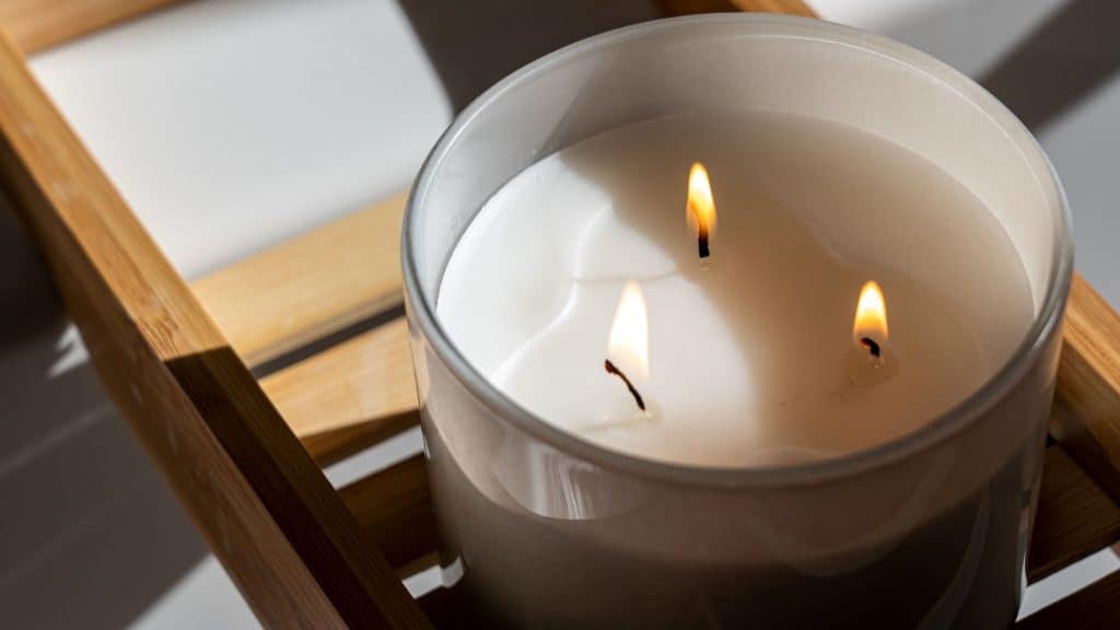 white three wick candle