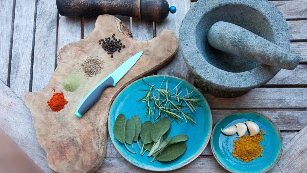mortar pestle and herbs