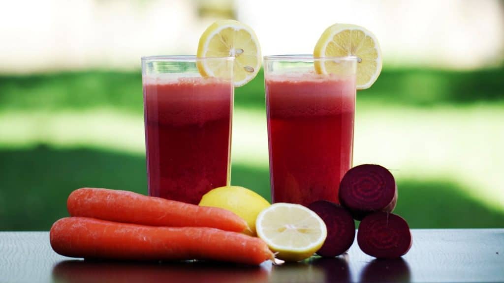 fresh juice with lemons and carrots