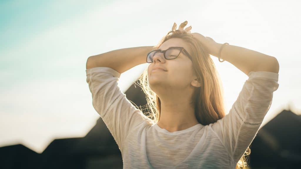 woman smiling with good mental health