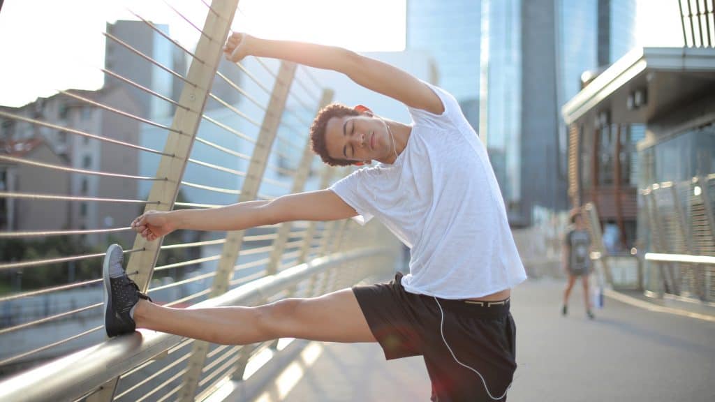 man running in athletic gear