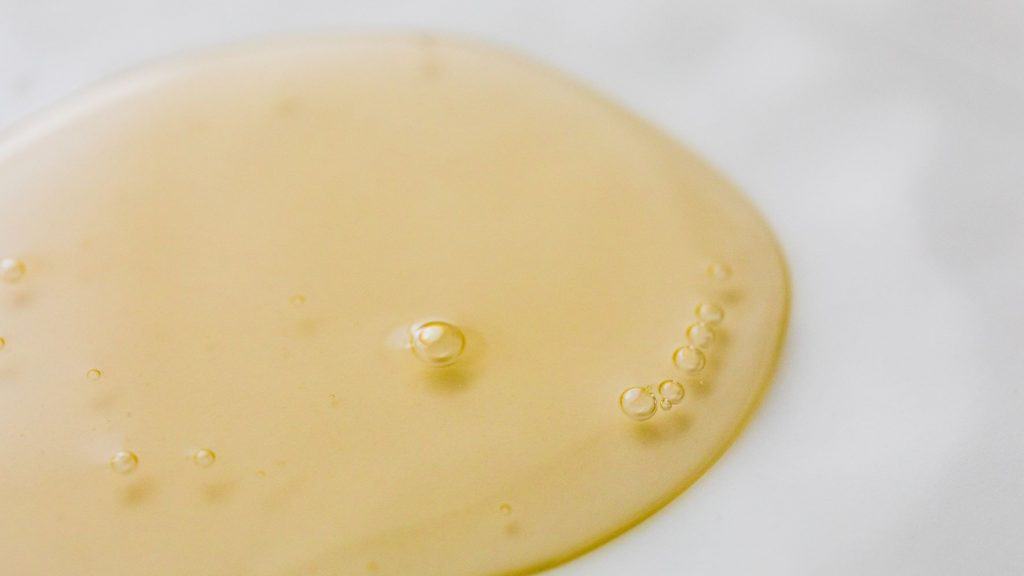 skincare line liquid on white background