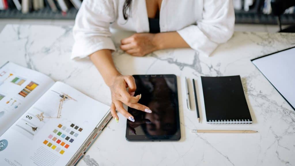 designer working on cosmetic packaging