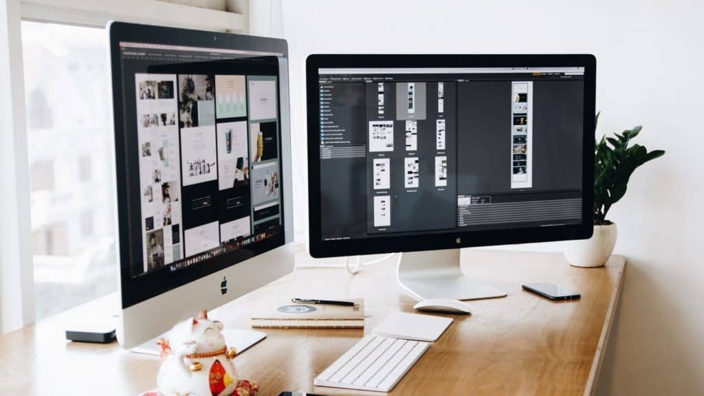 wellness website on multiple computer monitors