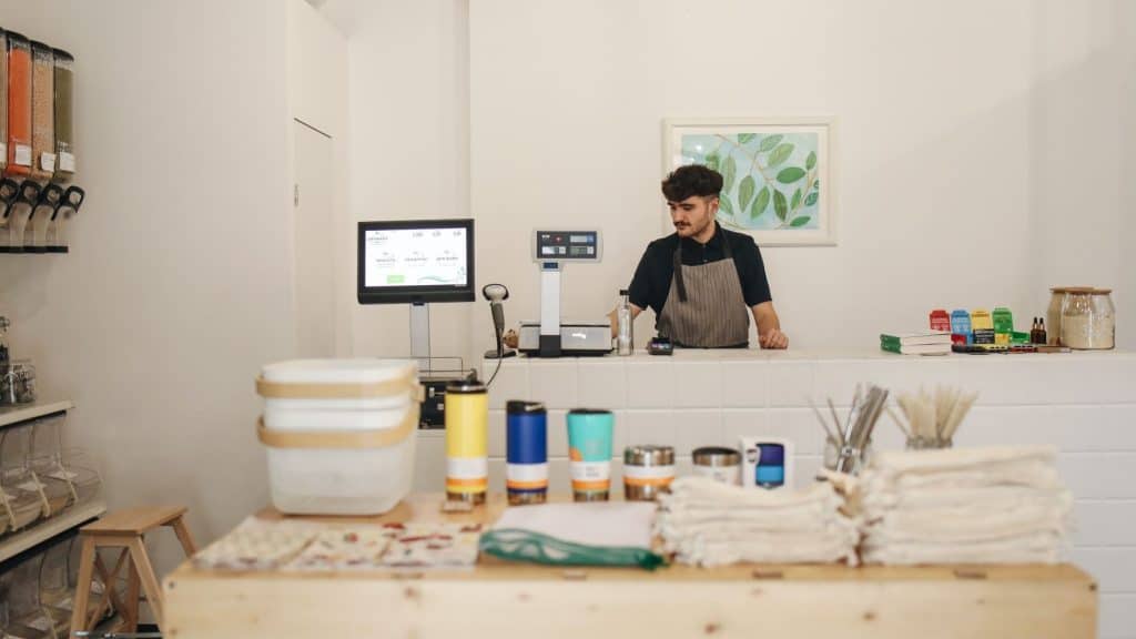 cashier in skincare retail store