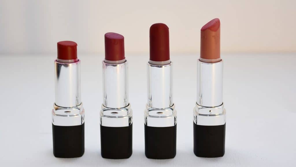 four lipstick cosmetics packaging design in a row