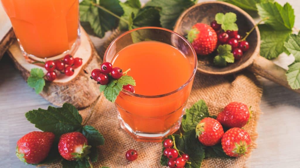 healthy drink branding with cranberries and strawberries