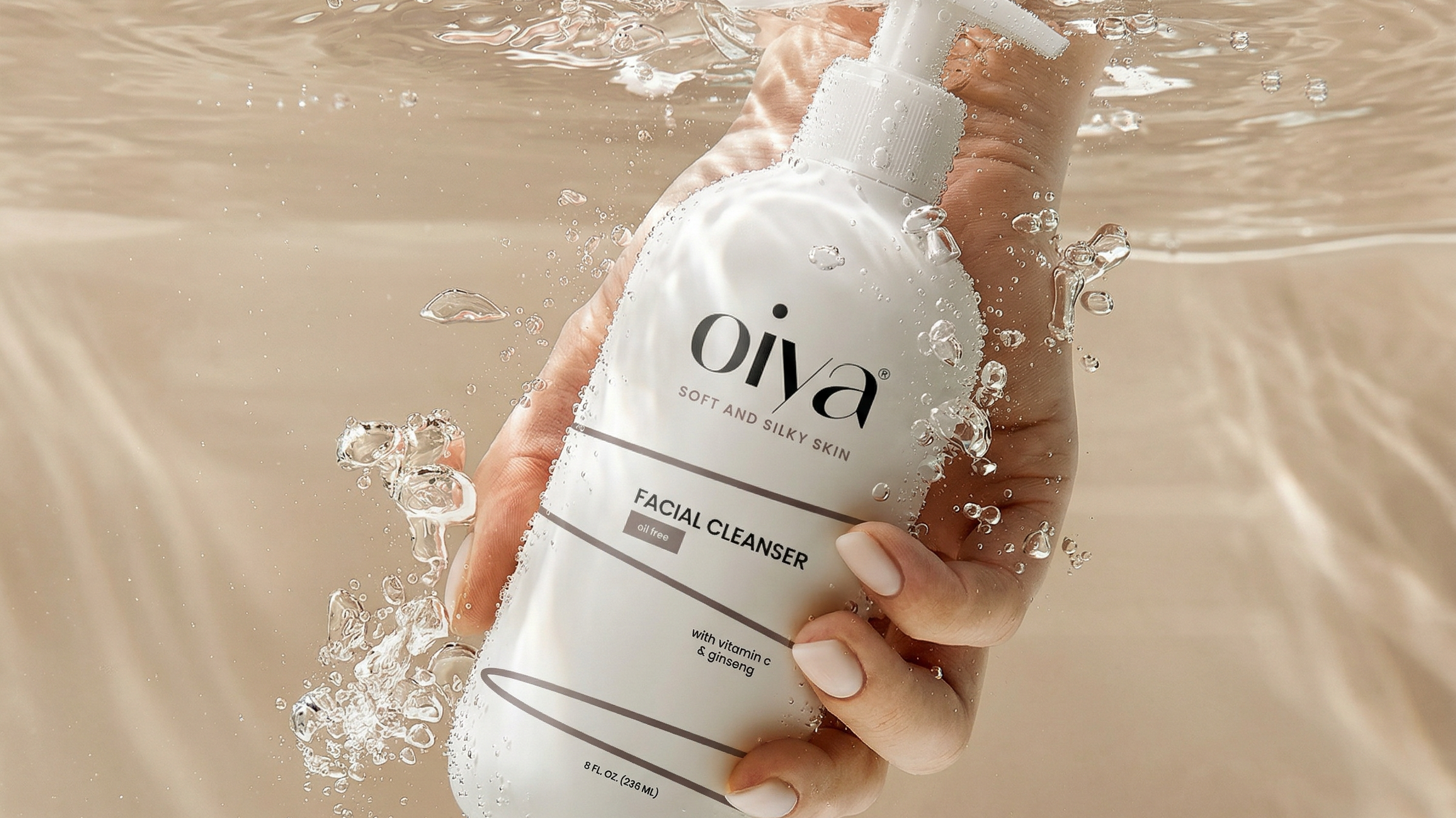 Logo design and packaging design presentation for facial cleanser with minimal skincare branding and underwater product visuals