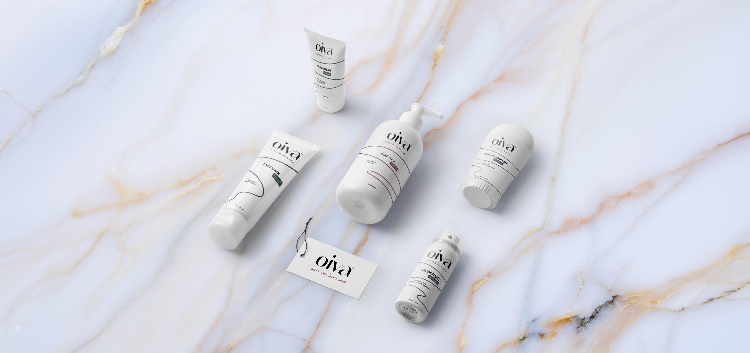 skincare products and label designs on them on a marble surface